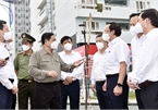 Hình ảnh Thủ tướng Phạm Minh Chính kiểm tra công tác phòng, chống dịch tại TP.HCM